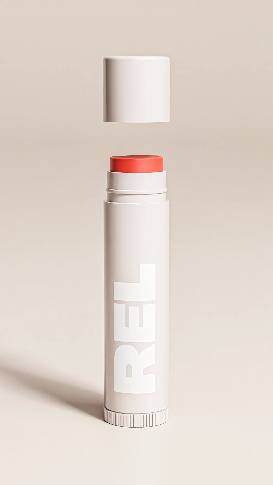 Lip balm stick with the cap lifted