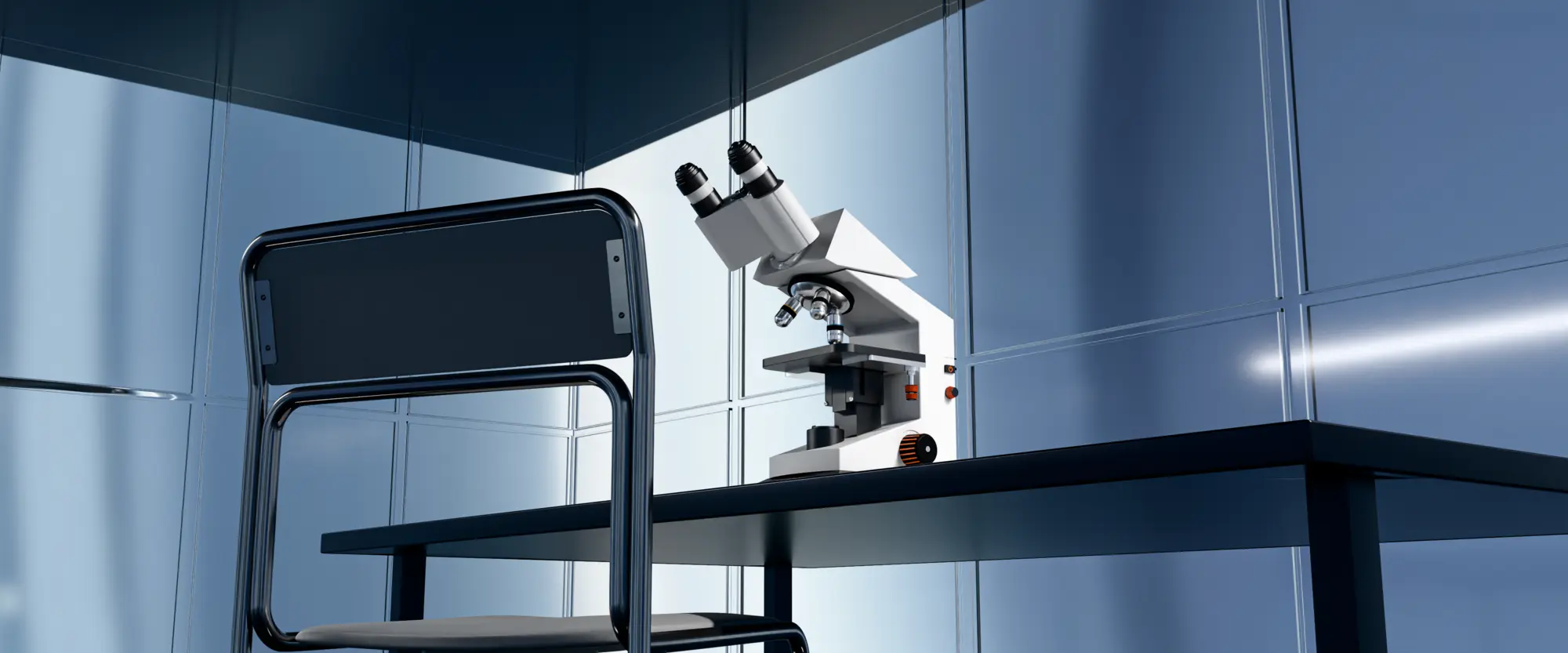 Microscope on a desk in a blue studio room
