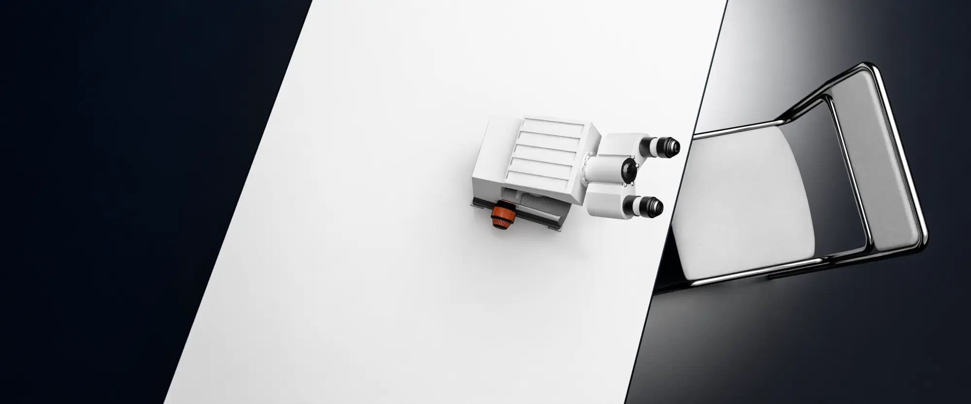 Microscope on a white panel against a dark background