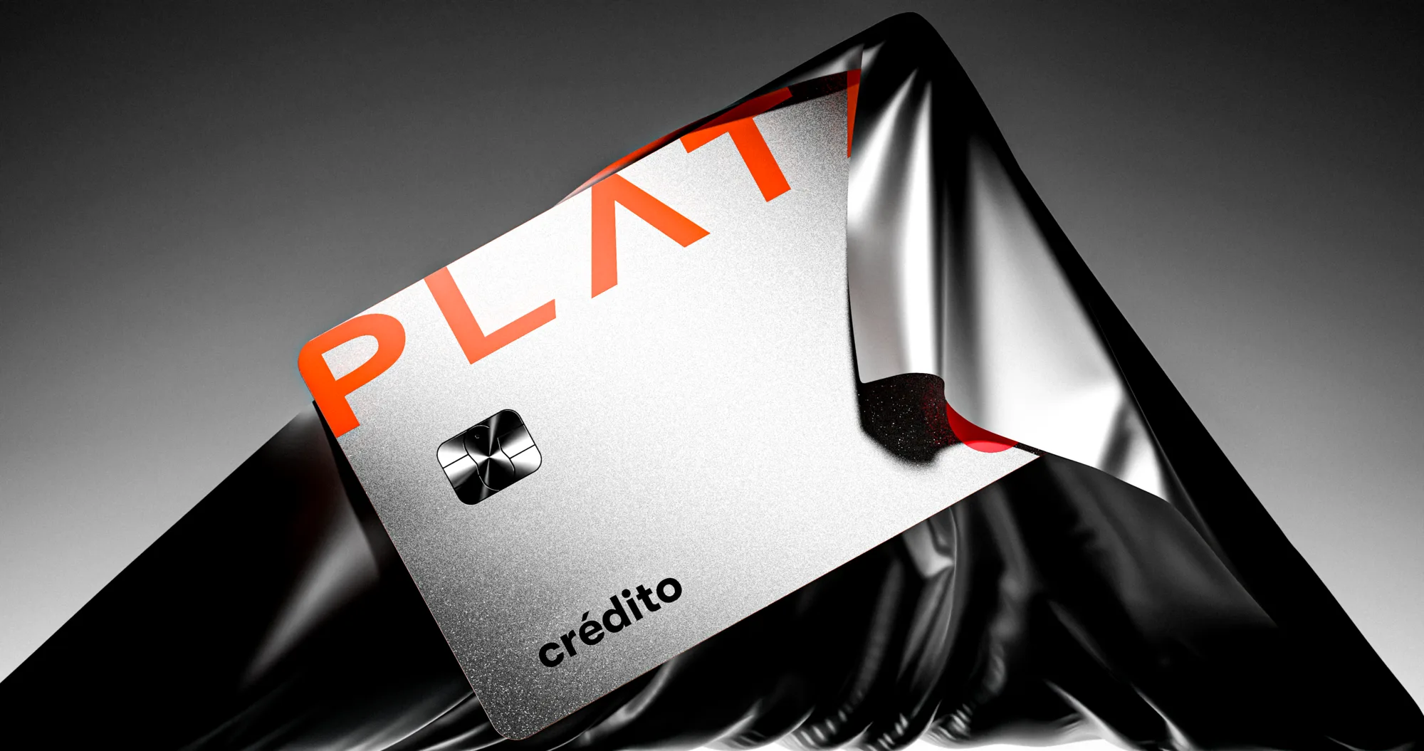 Card emerging from dark fabric